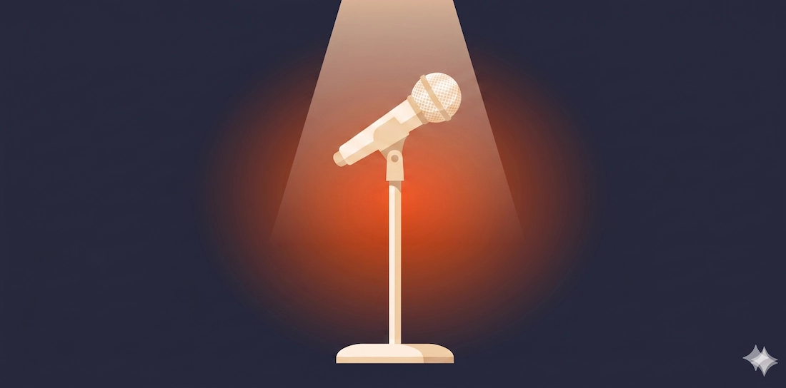 Microphone on stage with spotlight representing advanced performers